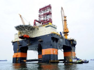 Scarabeo 9, a new Chinese-built drilling rig, is seen in Singapore in this August 26, 2011 handout photo. The Scarabeo 9, owned by Italian oil giant Eni SpA's offshore unit Saipem and contracted in Cuba by Spanish oil firm Repsol YPF, was anchored in Singapore and ready to leave on what an Eni spokesman said would be an 80-day voyage. Picture taken August 26, 2011. REUTERS/Keppel Offshore & Marine/Handout (SINGAPORE - Tags: ENERGY BUSINESS COMMODITIES) FOR EDITORIAL USE ONLY. NOT FOR SALE FOR MARKETING OR ADVERTISING CAMPAIGNS. THIS IMAGE HAS BEEN SUPPLIED BY A THIRD PARTY. IT IS DISTRIBUTED, EXACTLY AS RECEIVED BY REUTERS, AS A SERVICE TO CLIENTS (Newscom TagID: rtrlfour755278) [Photo via Newscom]